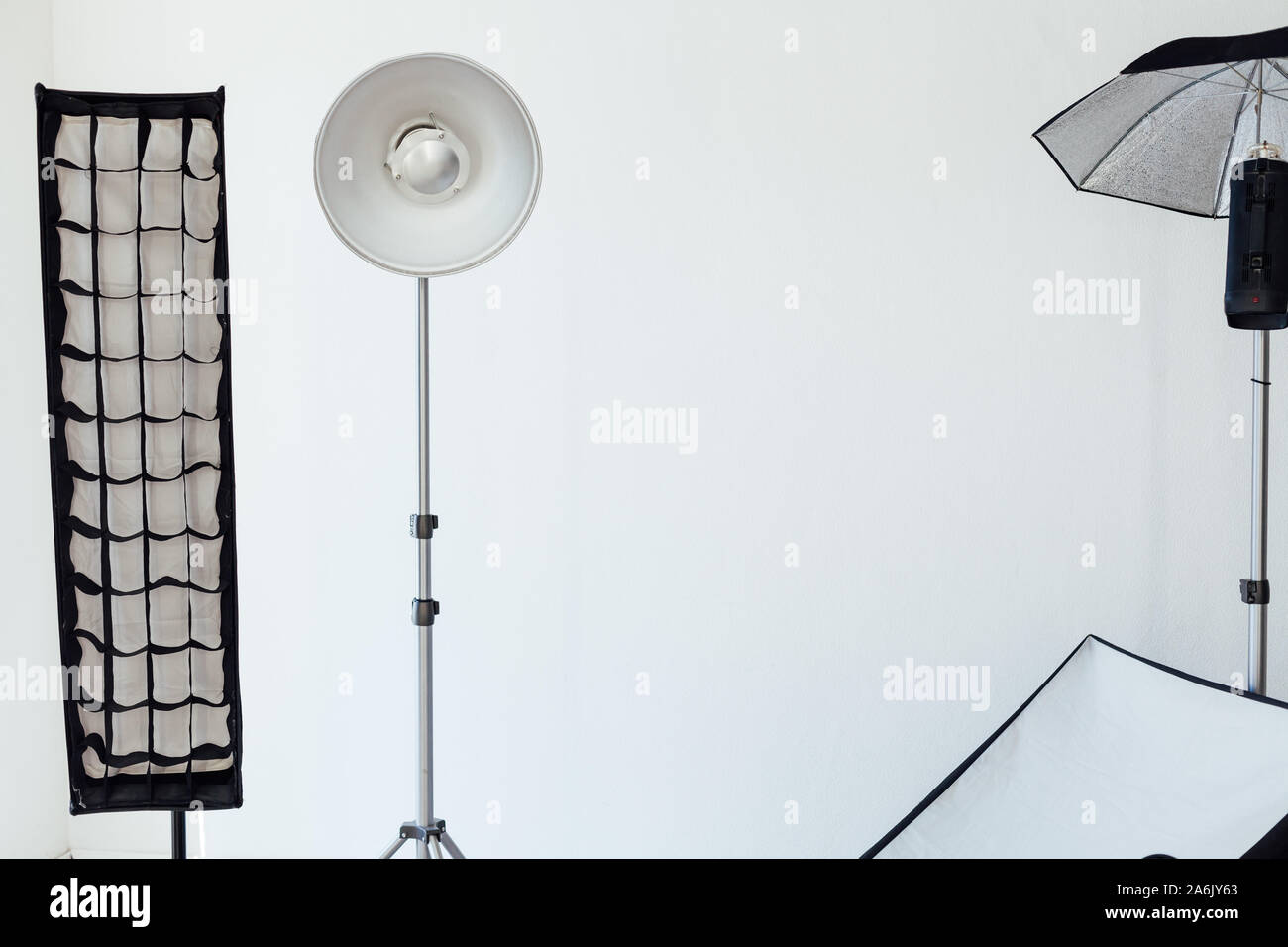 Photo studio equipment flash accessories photographer on a white ...