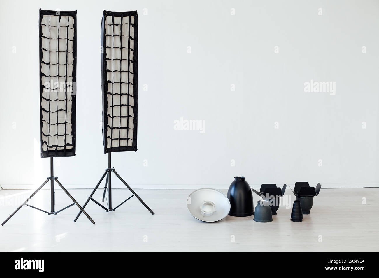 Photo studio equipment flash accessories photographer on a white ...