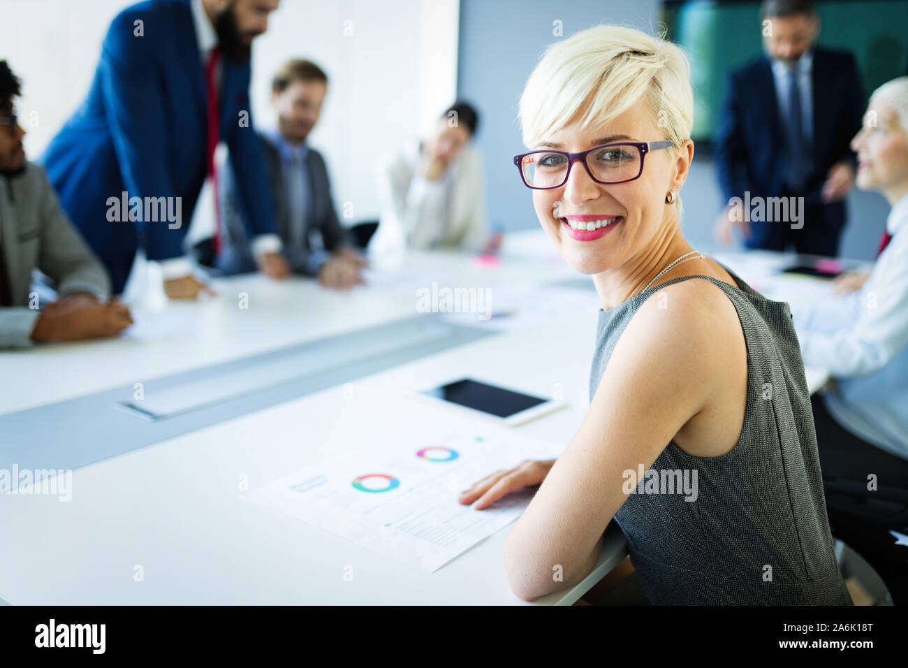 Group of business people discussing, brainstorming in office ...