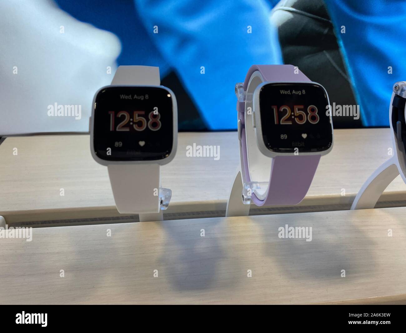 Fitbit Versa Lite Edition fitness smart watches on display at a retail  store Stock Photo - Alamy