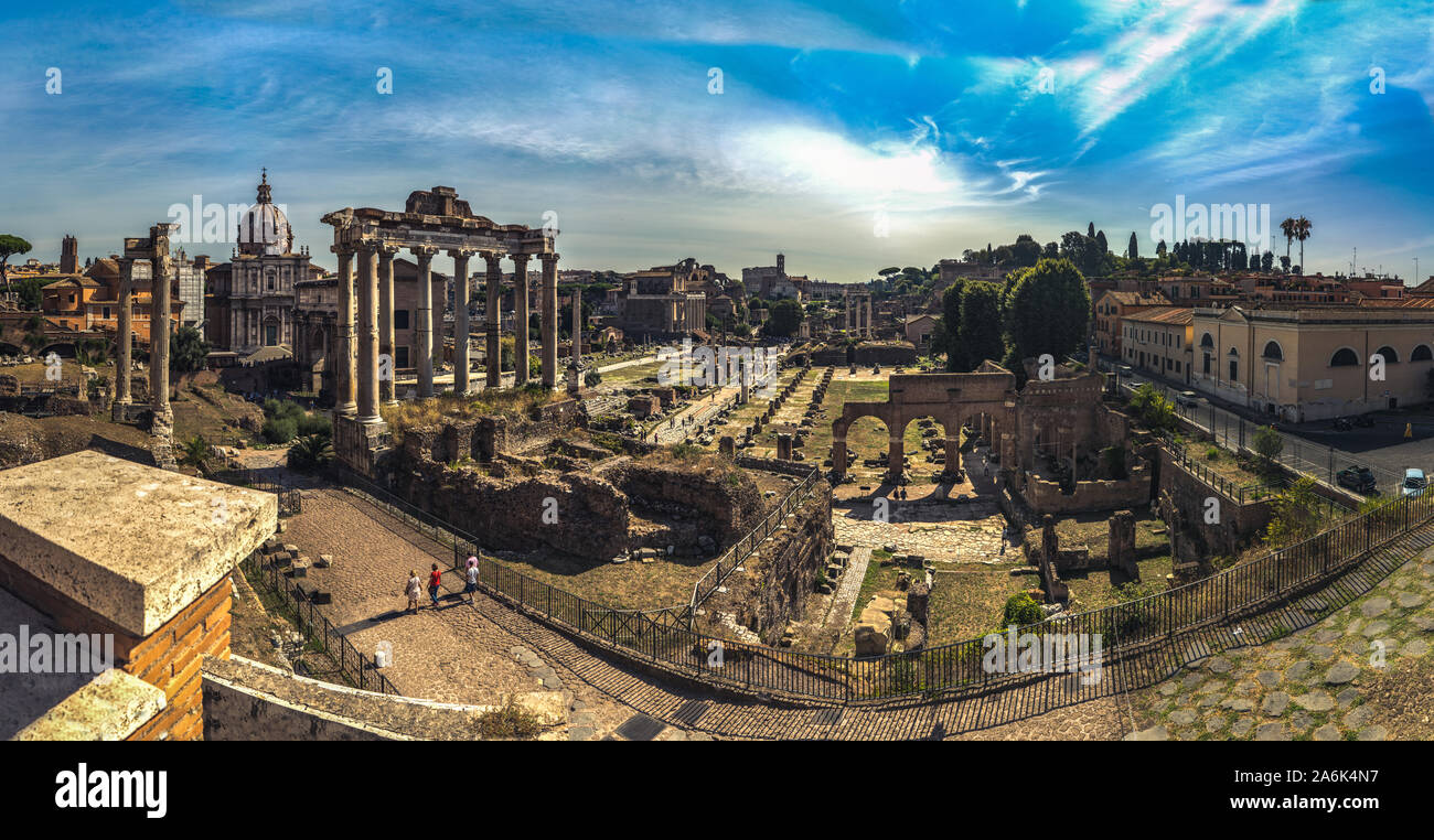 Beautiful panoramic view On Roman Forum from the hill in Rome, Italy. Scenic view on Foro Romano in Rome during nice sunny weather and blue sky Stock Photo