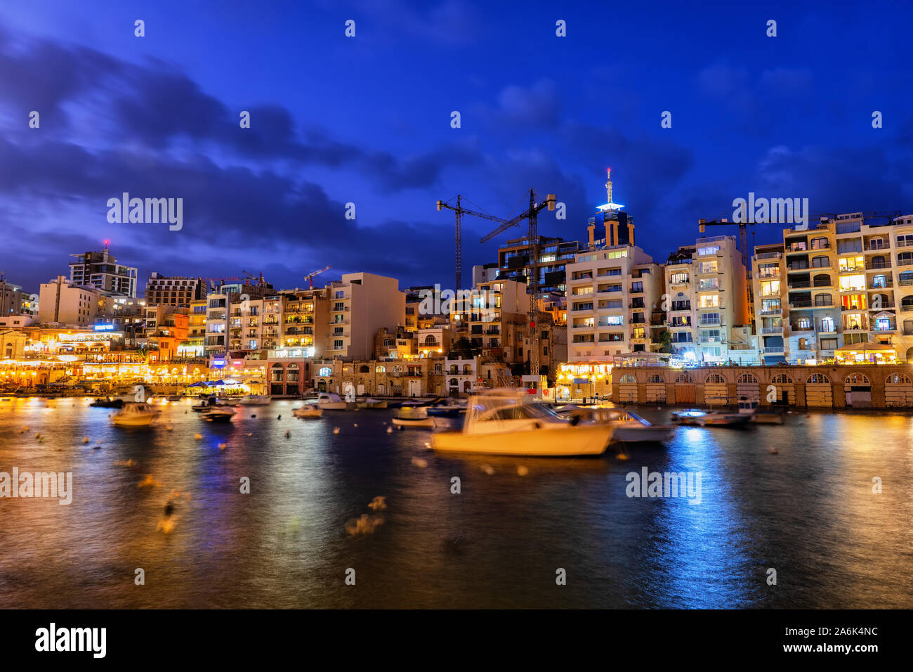 Paceville skyline in St. Julian town at night in Malta, apartment