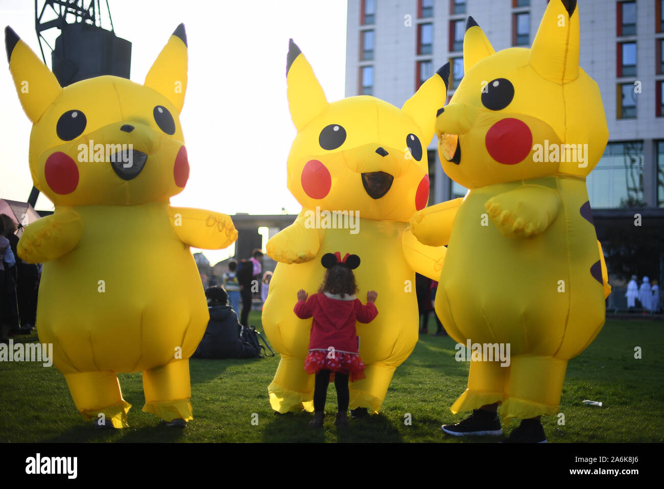 Cosplayers as Pokemons during the third day of MCM Comic Con at the ExCel London in east London. Stock Photo