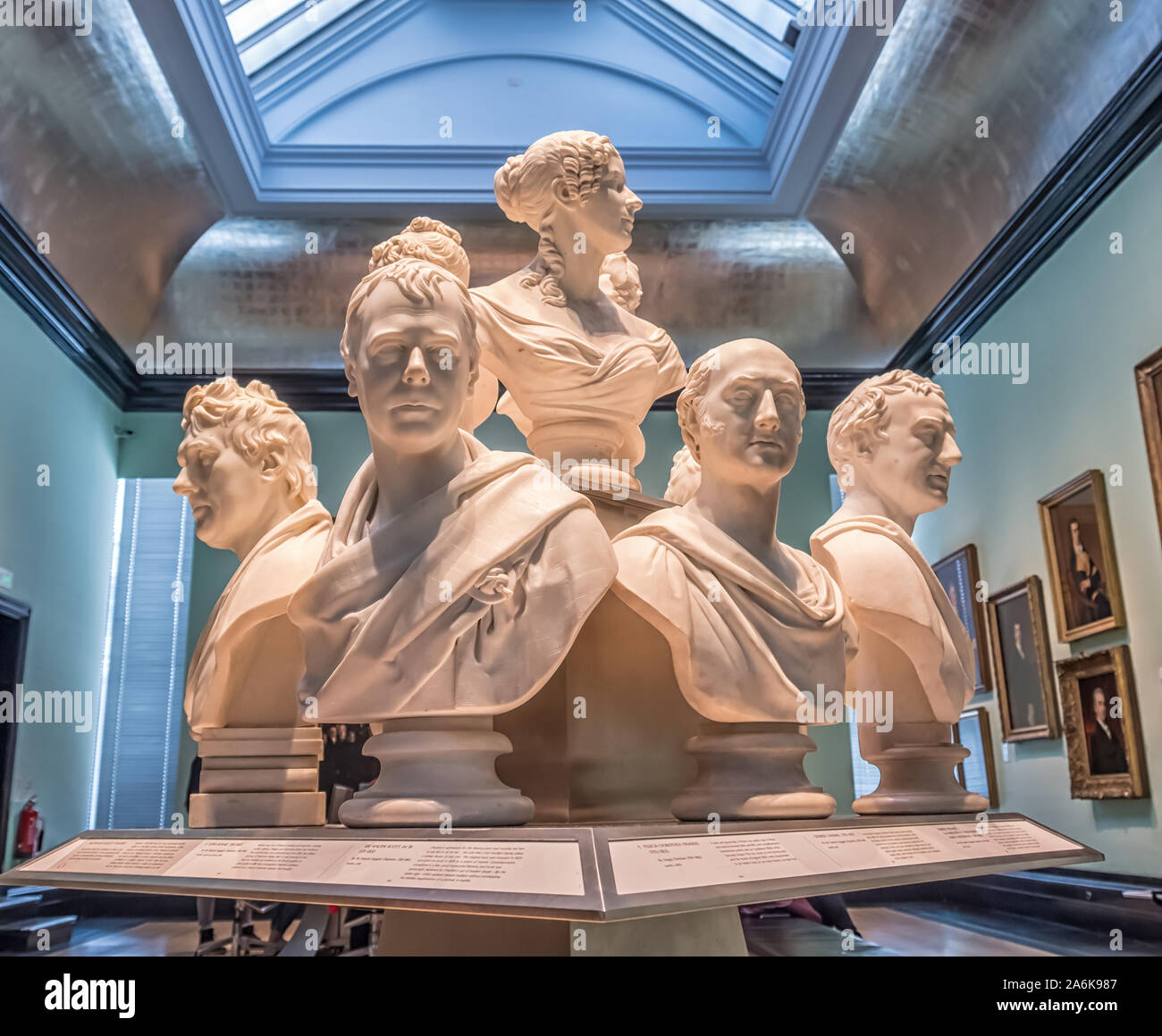 A group of Regency / Georgian / Victorian Marble Busts or Sculptures, National Portrait Gallery, London, UK - Shown in dramatic, overhead lighting Stock Photo