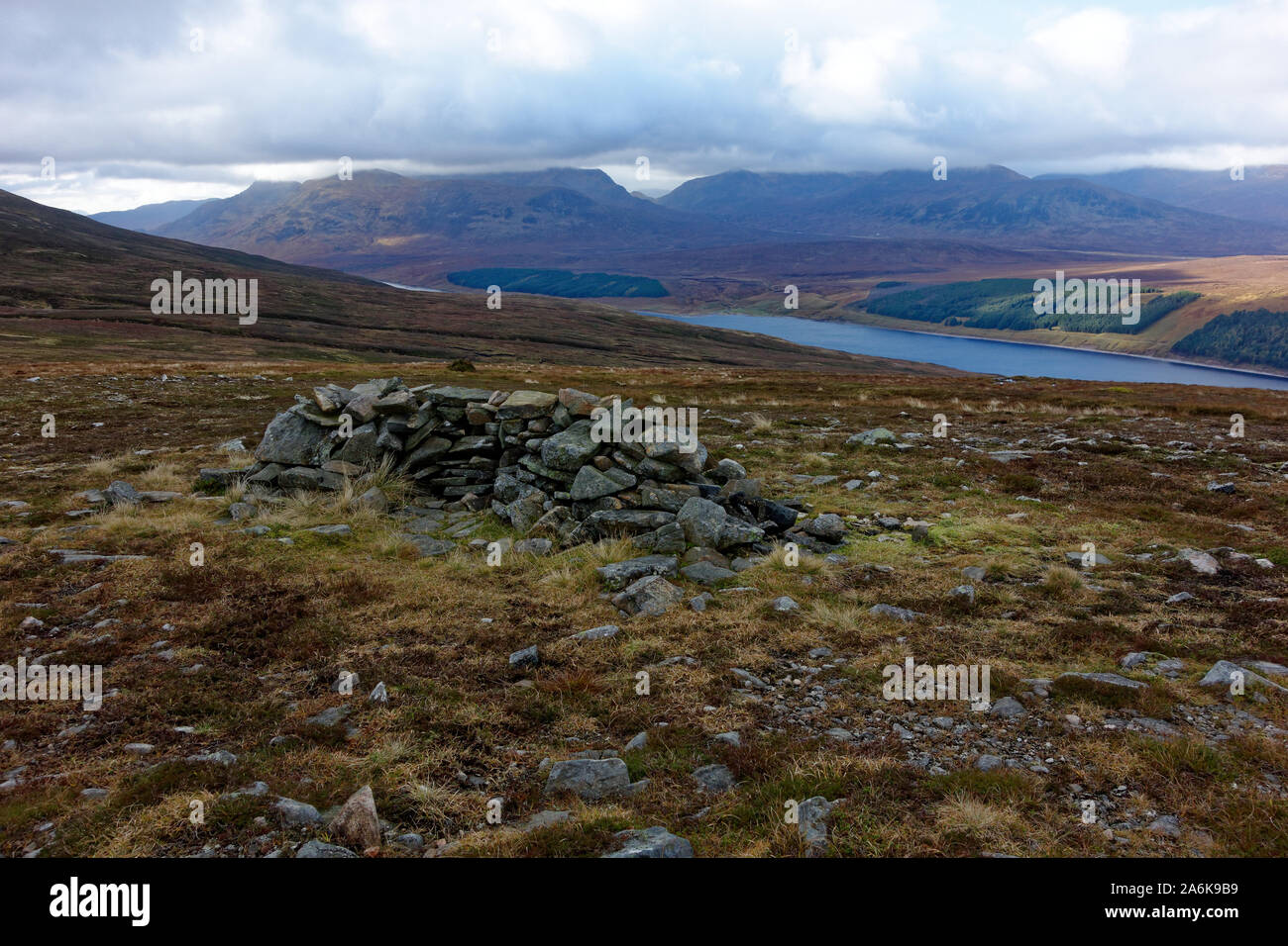 A collapsed stone shelter en the path to Beinn Udlamain Stock Photo