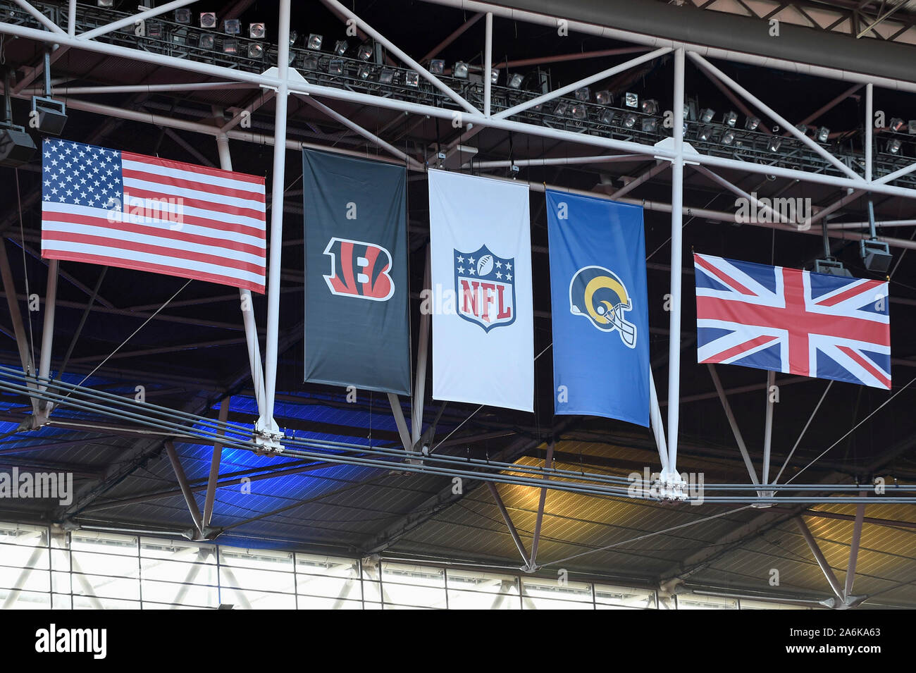 London, UK. 27 October 2019. National and team flags fly overhead ahead of  the NFL match Cincinnati Bengals v Los Angeles Rams at Wembley Stadium,  game 3 of this year's NFL London