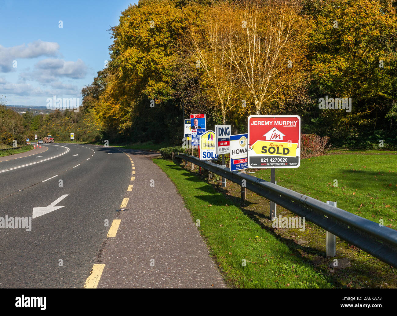 Douglas, Cork, Ireland. 27th October, 2019.  Property for sale notices on the roadway outside Mount Oval in Douglas, Co. Cork, Ireland. - Credit David Stock Photo