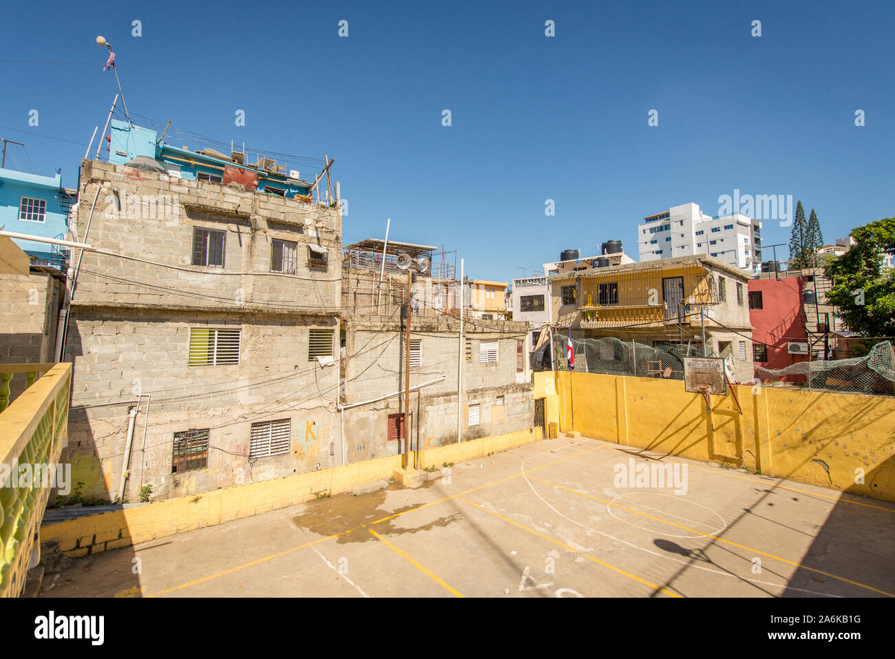 Santo Domingo, La Altagracia / Dominican Republic - April 11 2014: Sad Looking School Yard in Poor Neighbourhood La Yuca Stock Photo