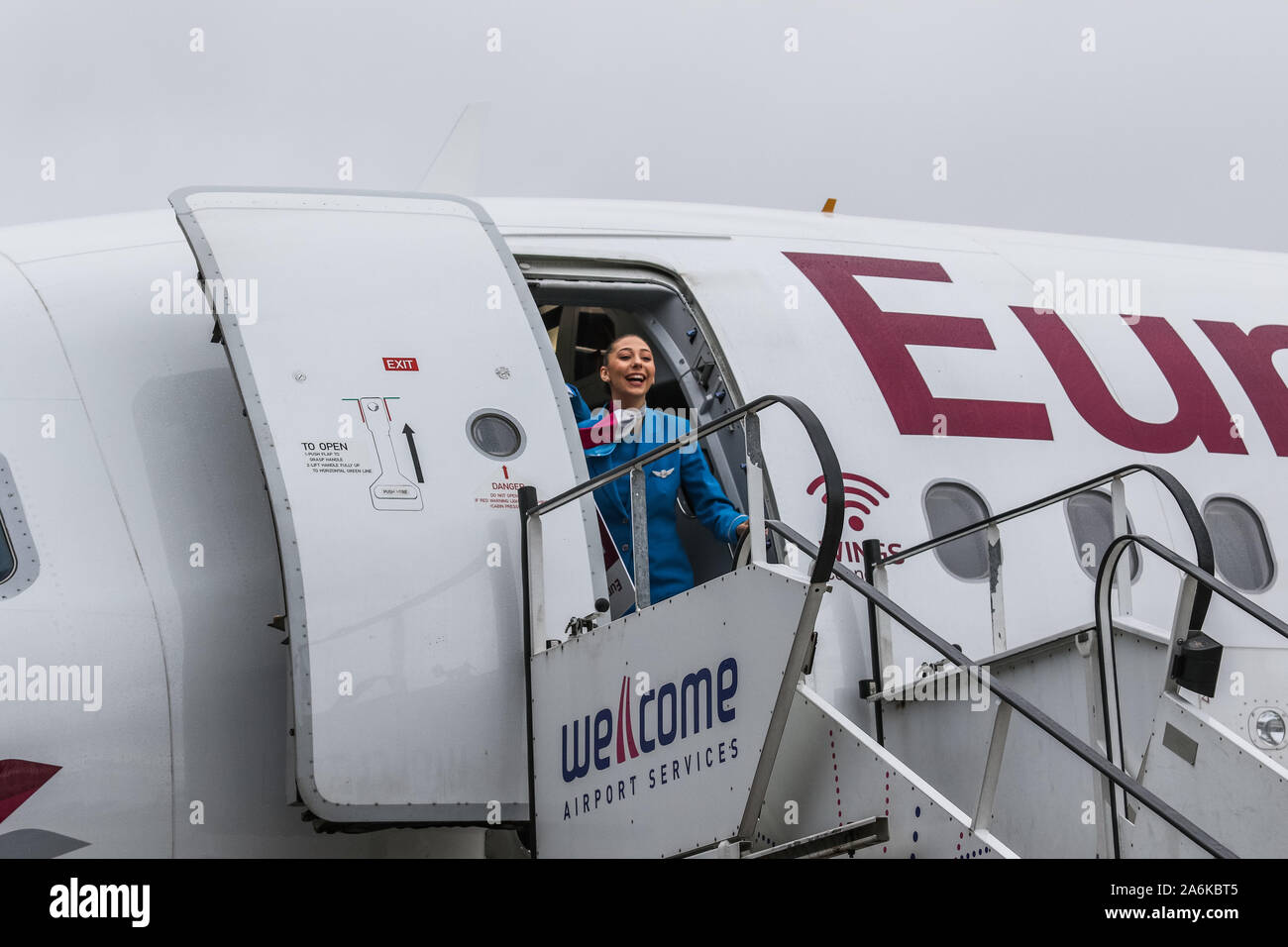 Gdansk, Poland 27th, Oct. 2019 Eurowings (Lufthansa group) Airbus A319-132 (reg. No. D-AGWU) stewardess at Gdansk Lech Walesa Rebiechowo GDN airport is seen in Gdansk, Poland on 27 October 2019  Eurowings lines inaugurated Gdansk - Dusseldorf (Germany) route, and will operate on  it 4 times weekly. © Vadim Pacajev / Alamy Live News Stock Photo