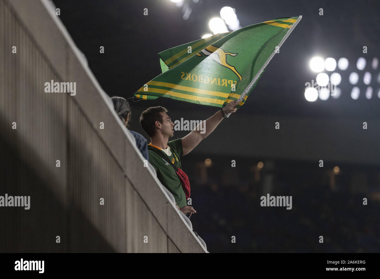 Kanagawa, Japan. 27th Oct, 2019. A man waves a flag of South Africa team, called the Springboks or colloquially the Boks, before starting the Rugby World Cup 2019 Semi-Final 2 between Wales and South Africa at International Stadium Yokohama, near to Tokyo. South Africa defeats Wales 19-16. Credit: Rodrigo Reyes Marin/ZUMA Wire/Alamy Live News Stock Photo