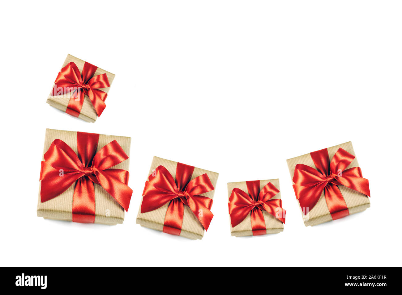 Festive gift boxes with red ribbon bow isolated on white background ...