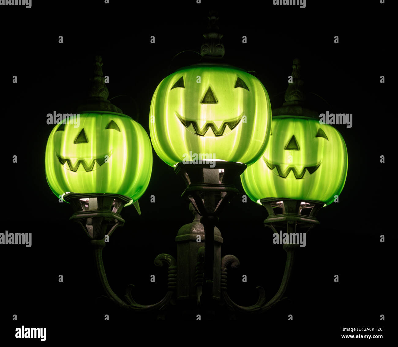 Halloween pumpkin light fixtures decorating front porch Stock Photo