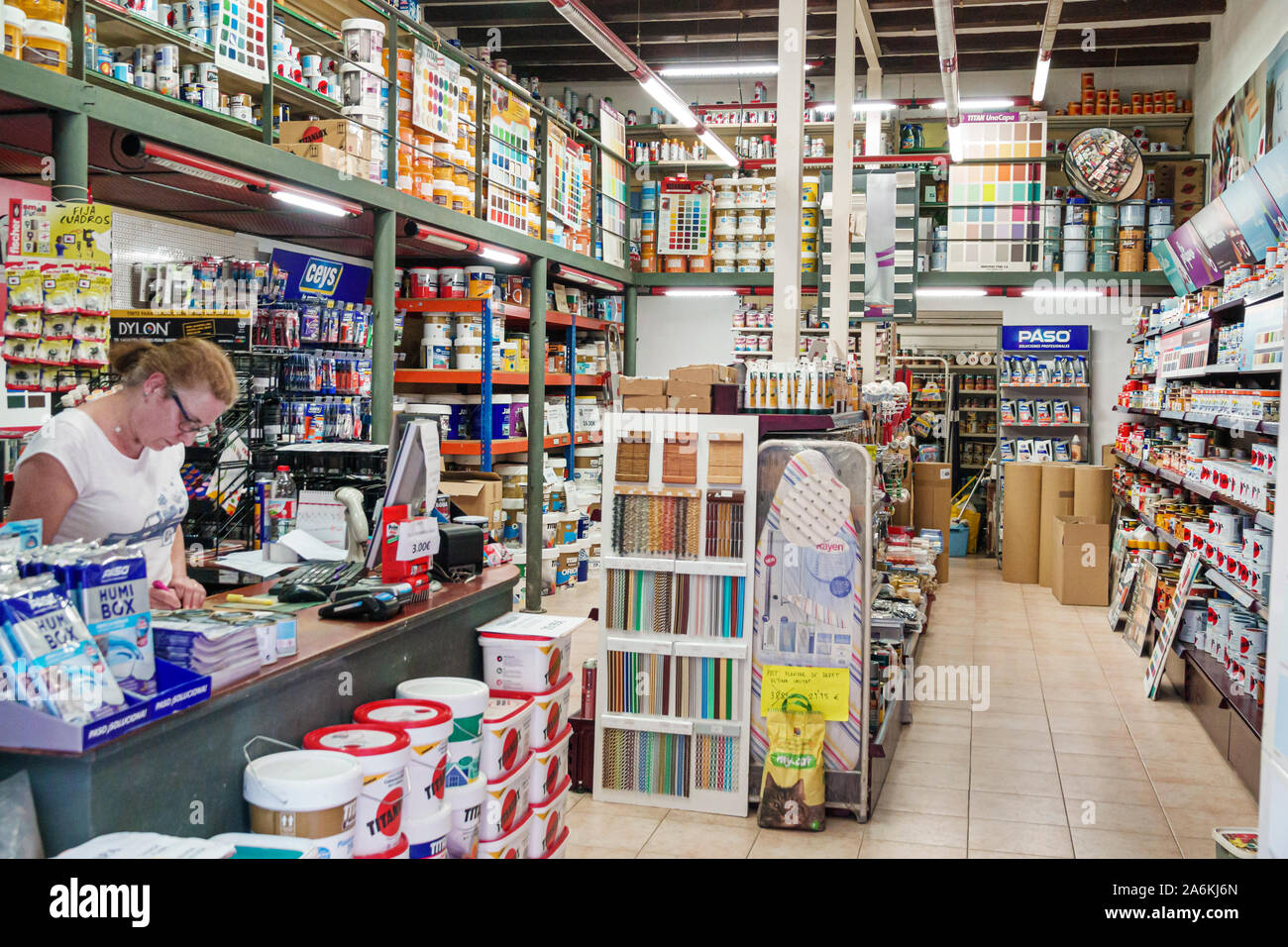 Barcelona Spain,Catalonia Gracia neighborhood,hardware store,small business,inside,home improvement,counter worker,woman,Hispanic,ES190820157 Stock Photo