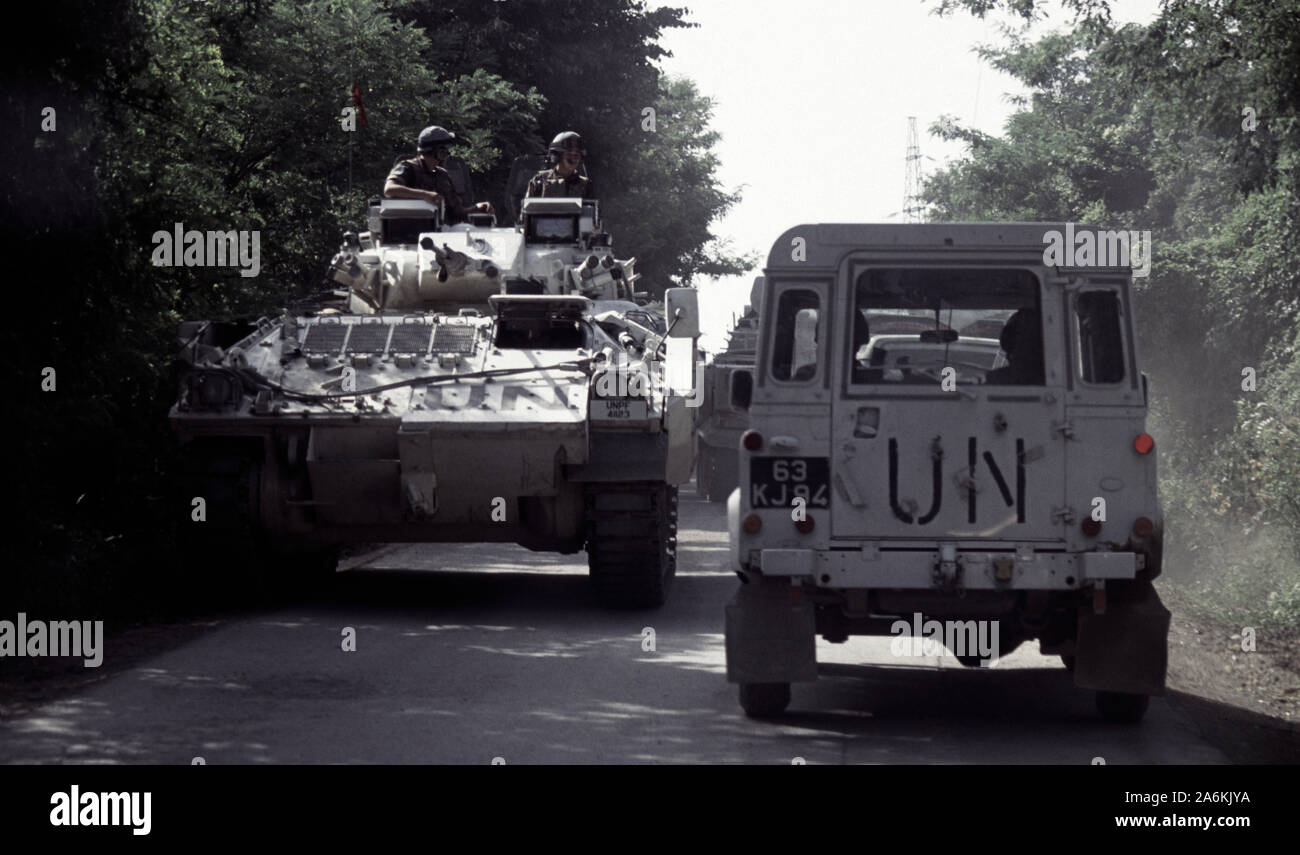 5th July 1993 During the war in Bosnia: on Route Diamond, just north of Gornji Vakuf, a British Army Warrior MCV (Mechanised Combat Vehicle) of the Cheshire Regiment pulls over to allow another Warrior and a Land Rover to pass. Stock Photo
