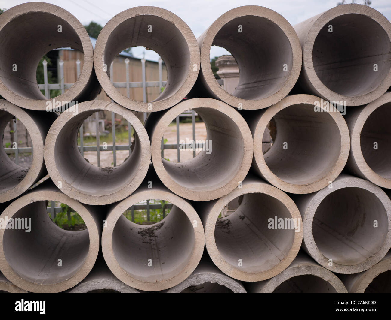 Precast round concrete pipe stacked together Stock Photo Alamy