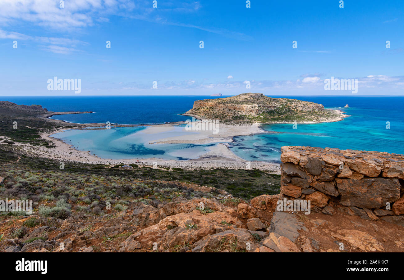 Panorama of Balos Lagoon and Gramvousa island on Crete island, Greece. Beautiful blue sky in front of grass. Stock Photo