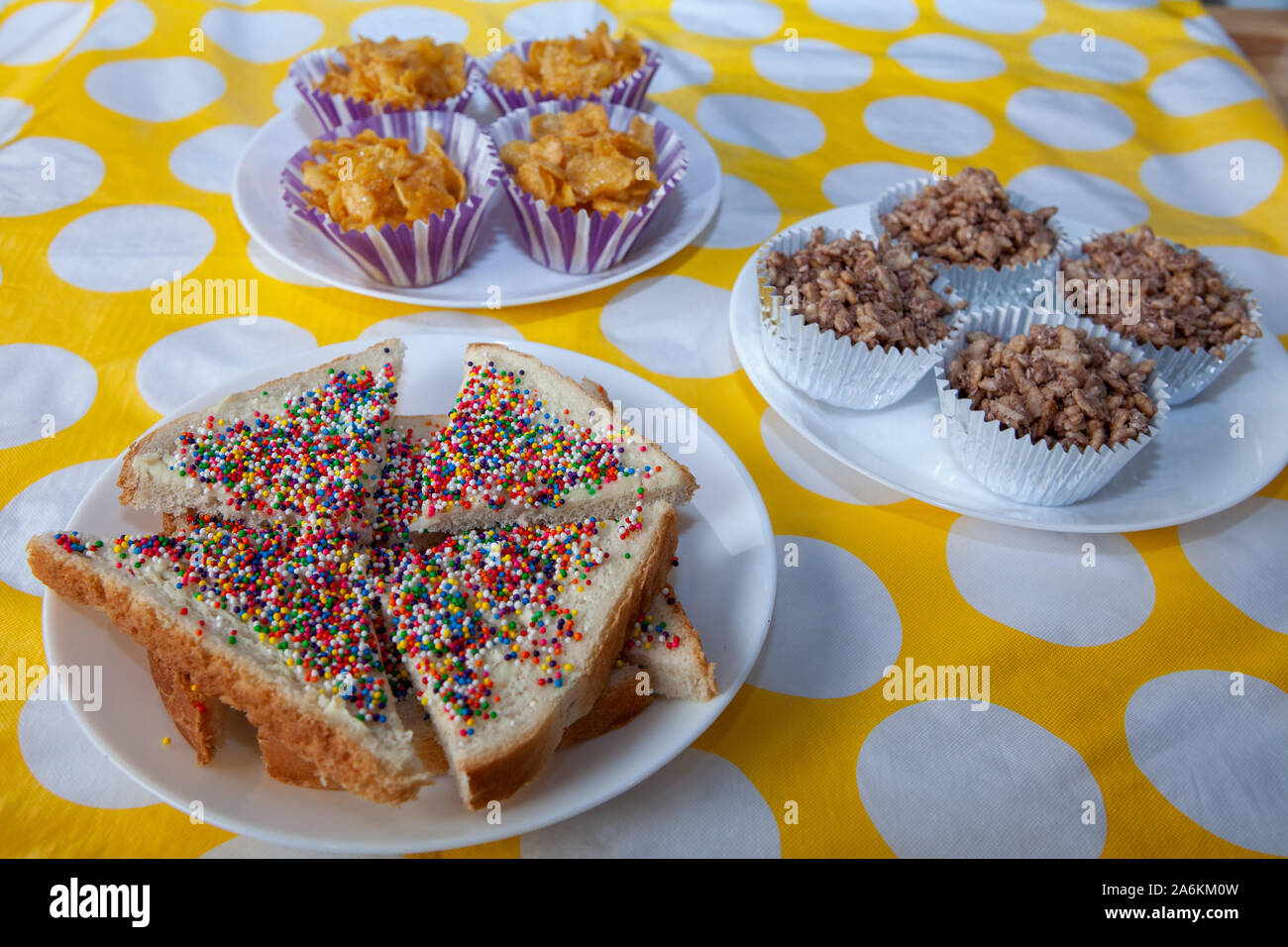 A party spread of Fairy Bread, Honey Joys and Chocolate Crackles Stock