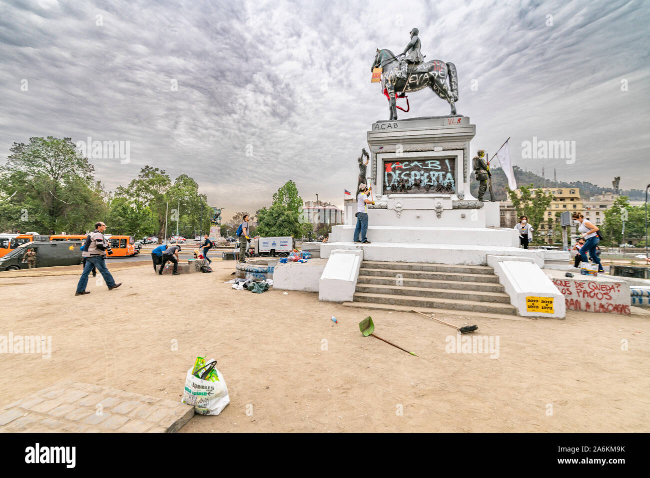 'Santiago de Chile Chile 26/10/2019 Real people help on cleaning the streets and recover normality during the latest riots at Santiago de Chile Stock Photo