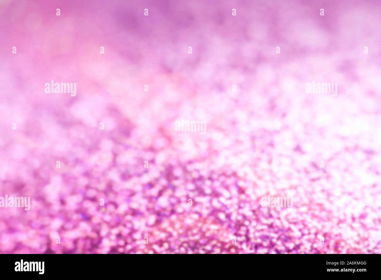 Abstract blurred pink tone glowing Christmas lights background Stock Photo