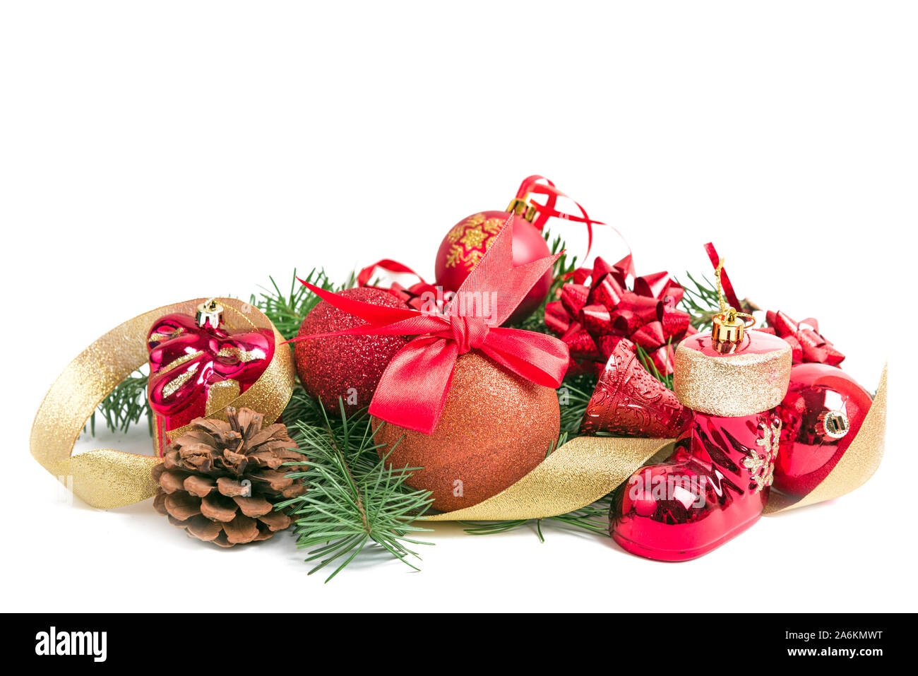 Christmas decoration bauble, pine cone, gift shoe and other holiday objects on a white background Stock Photo