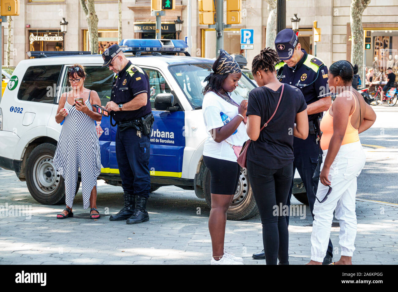 Barcelona Spain,Catalonia Catalunya,Passeig de Gracia,Black Blacks African Africans ethnic minority,man men male adult adults,woman women female lady Stock Photo