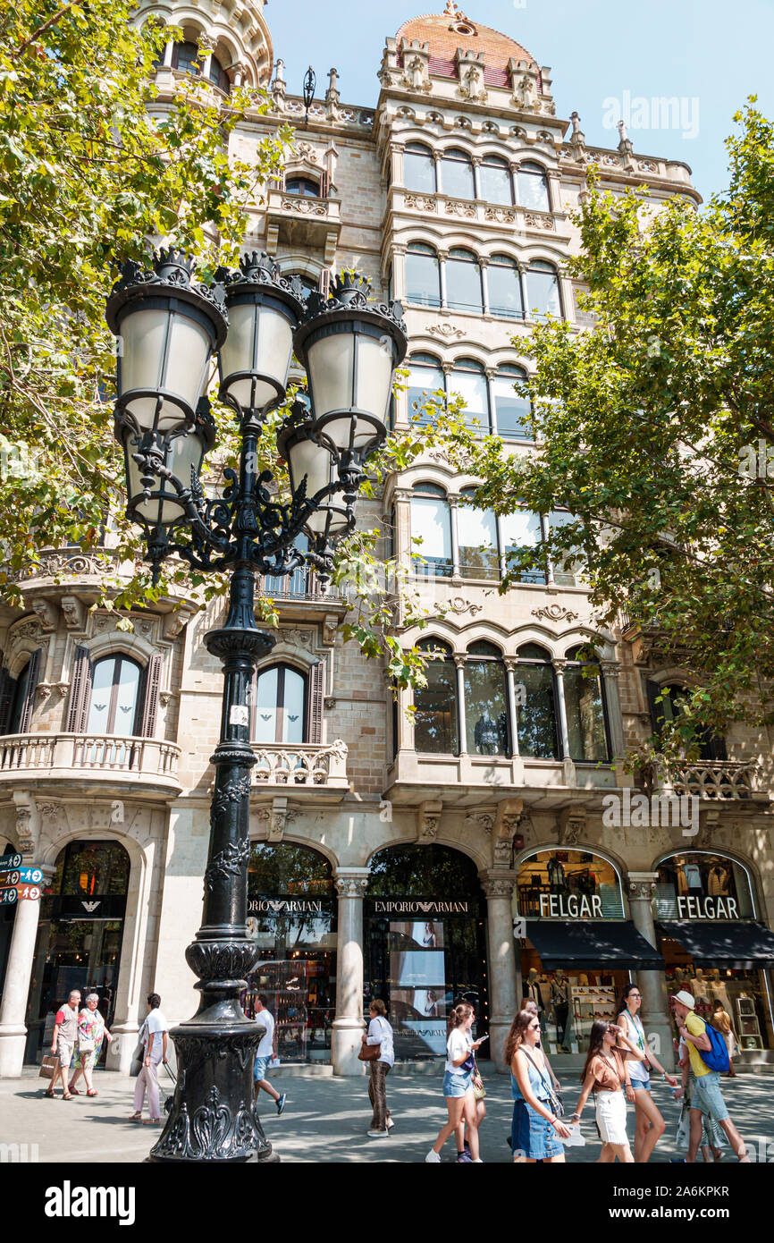Barcelona Spain,Catalonia Eixample,Passeig de Gracia,Casa Rocamora,building exterior,Modernism,architecture,by Bassegoda i Amigo,lamppost,pedestrians, Stock Photo