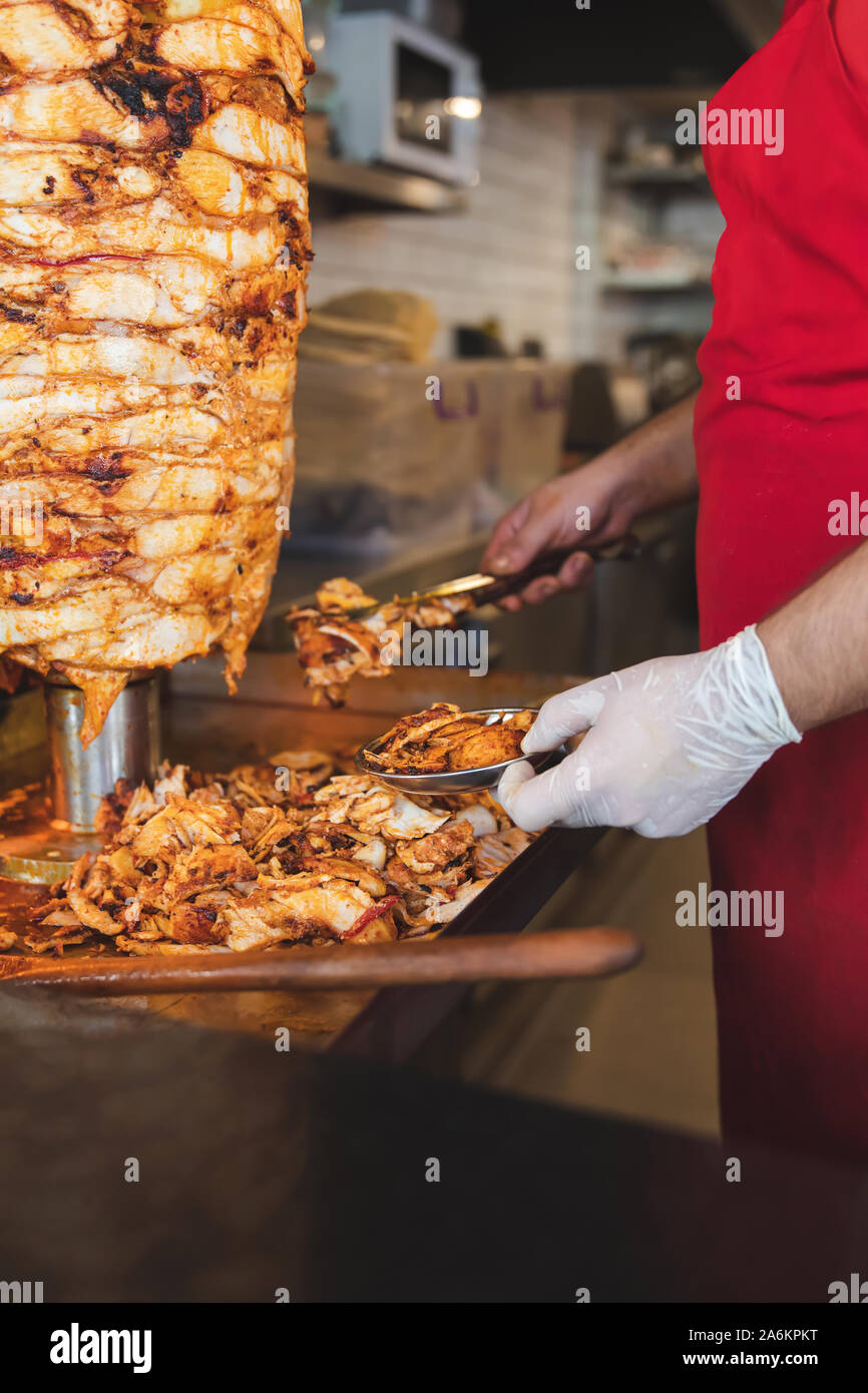 Chef preparing and making Traditional Turkish Doner Kebab meat