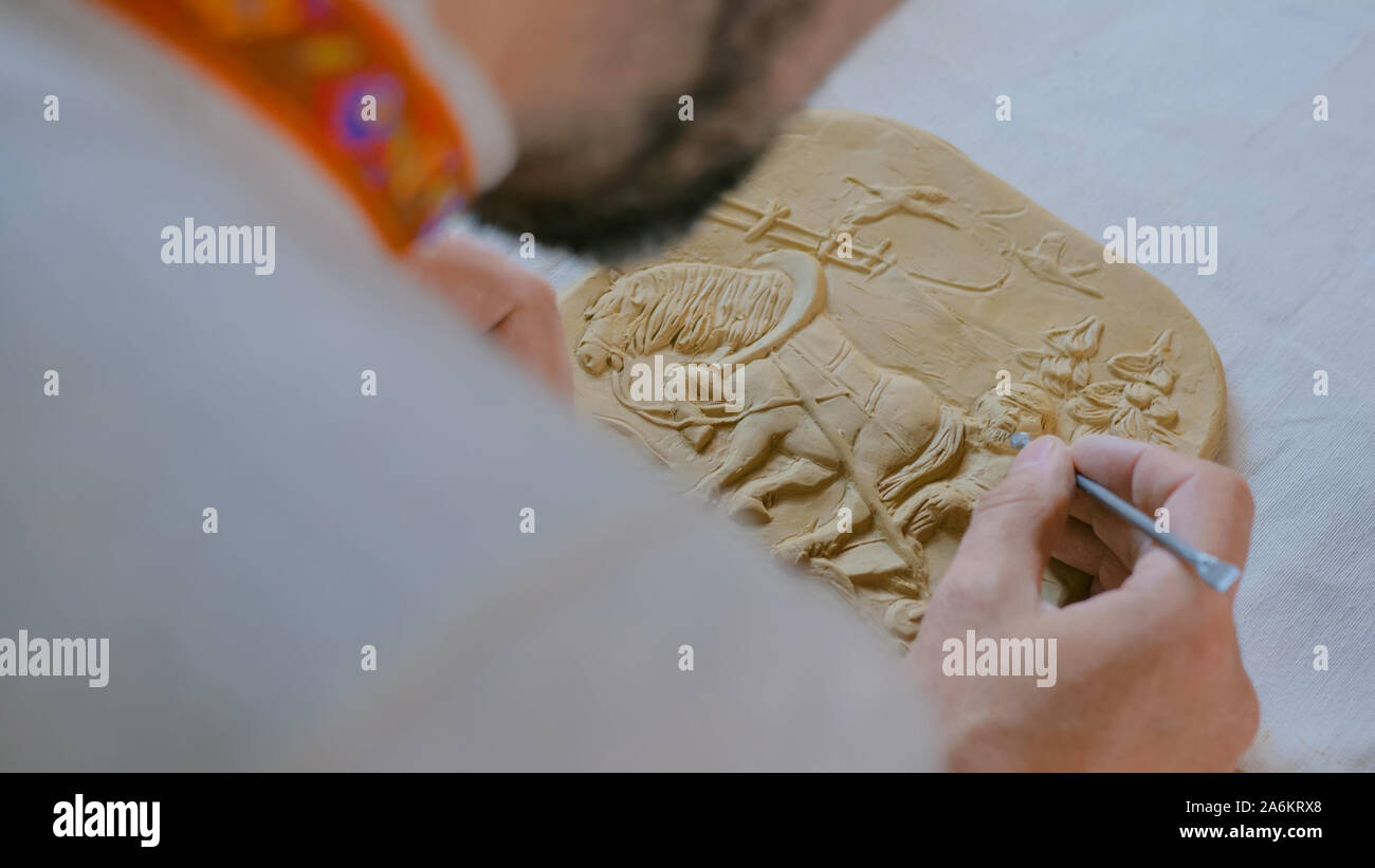 Potter making clay stamp picture Stock Photo Alamy