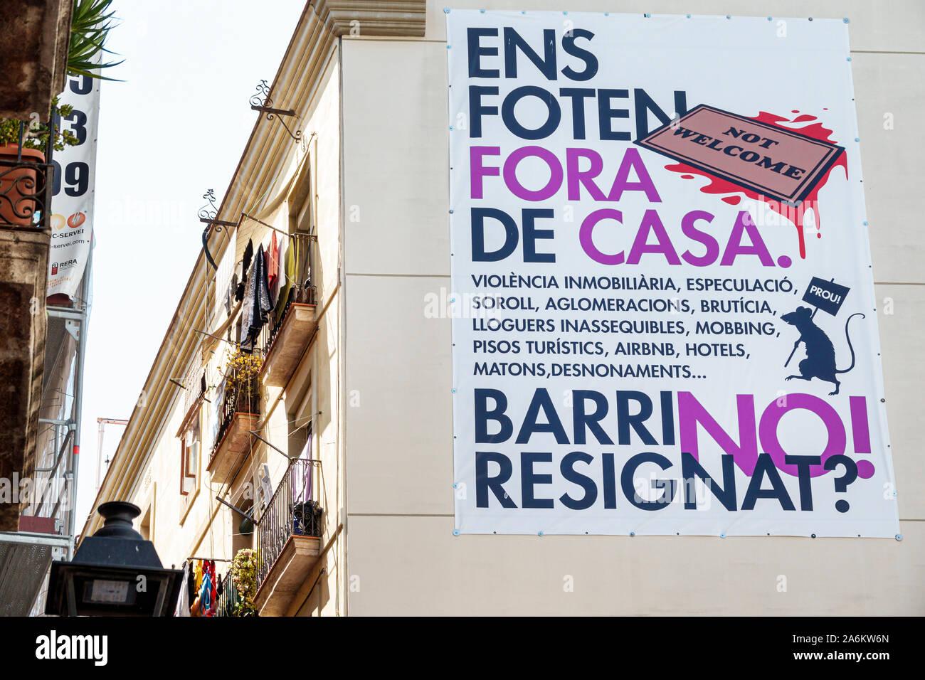Barcelona Spain,Catalonia Ciutat Vella,El Raval,building exterior,neighborhood anti violence crime campaign,poster,Catalan language,ES190824058 Stock Photo