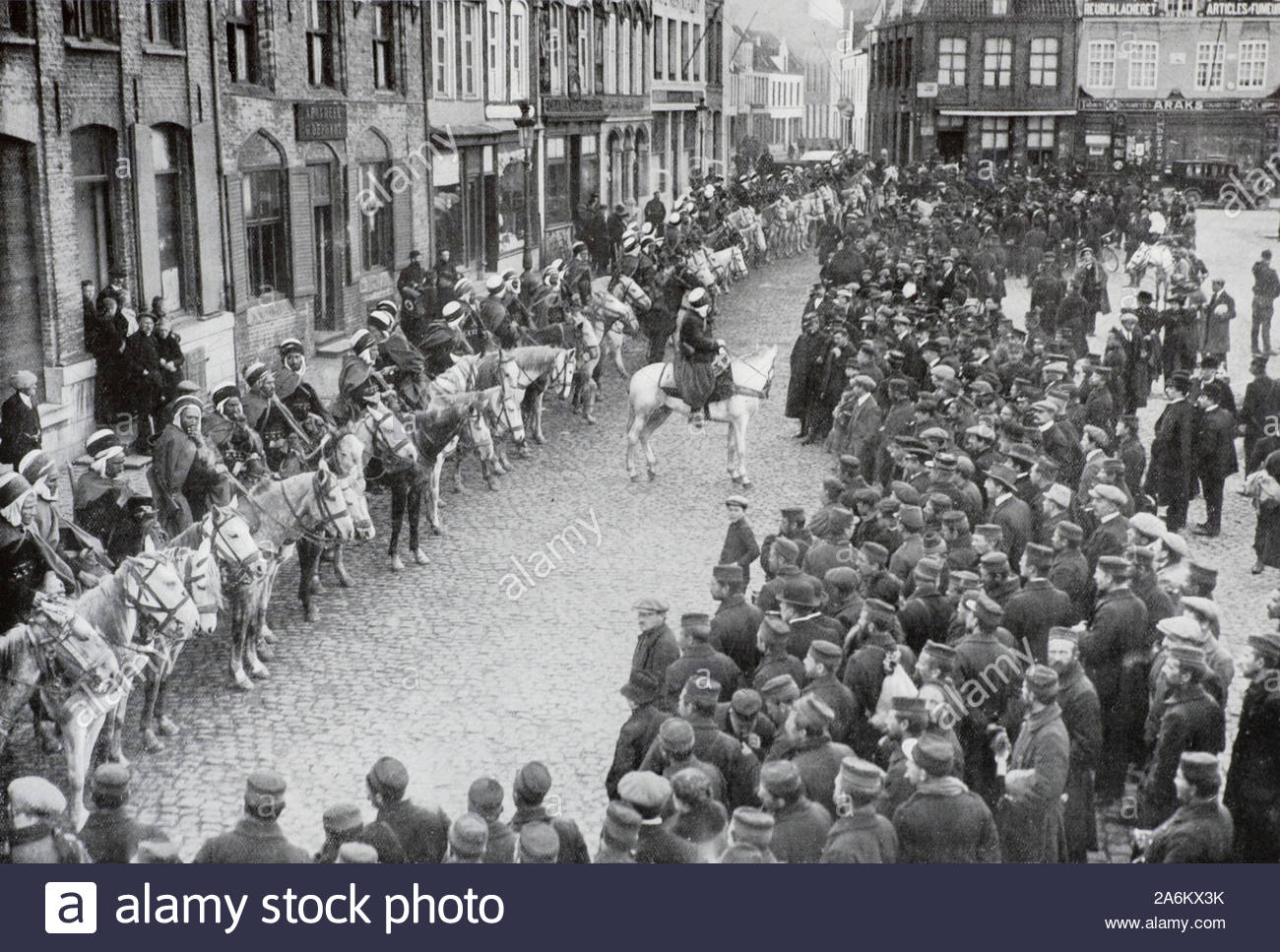 WW1 French Algerian Spahis Light cavalry in Furnes Market Square Belgium, vintage photograph from 1914 Stock Photo