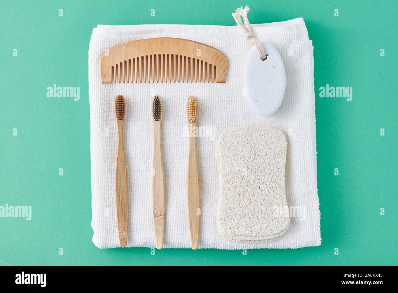 Body care products on green mint background, flat lay top view with ...