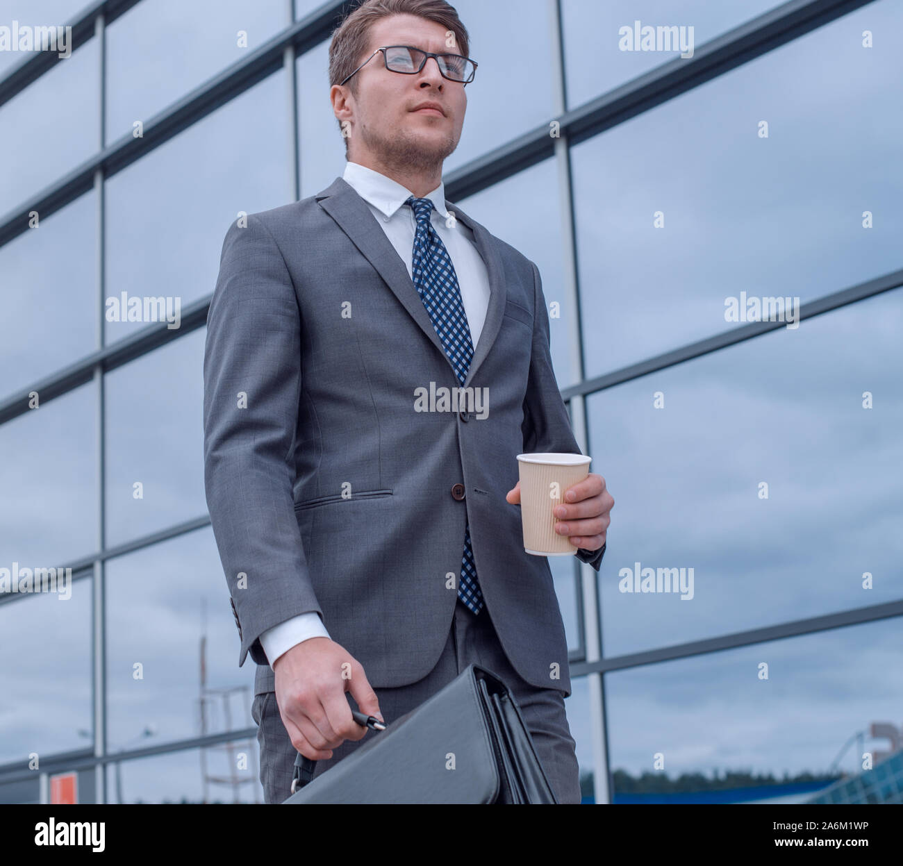 business man walking down the street of a big city Stock Photo - Alamy