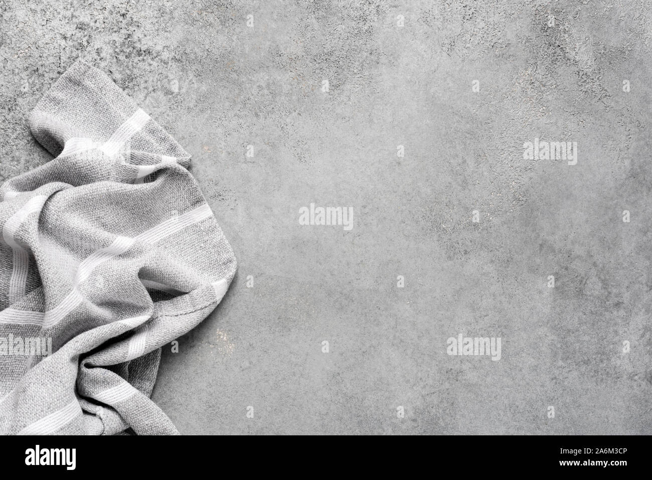 Linen kitchen napkin on grey concrete background. Design template element for restaurant or cafe menu, recipe, mock up Stock Photo