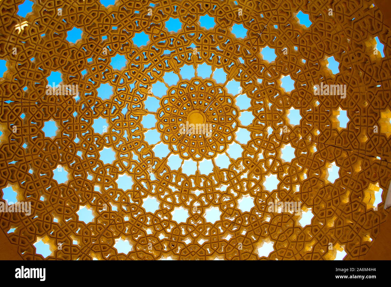 Roof design of dome, gold in colour with cut out stars and other geometric  shapes. Would make a beautiful background. Muscat, Oman Stock Photo - Alamy