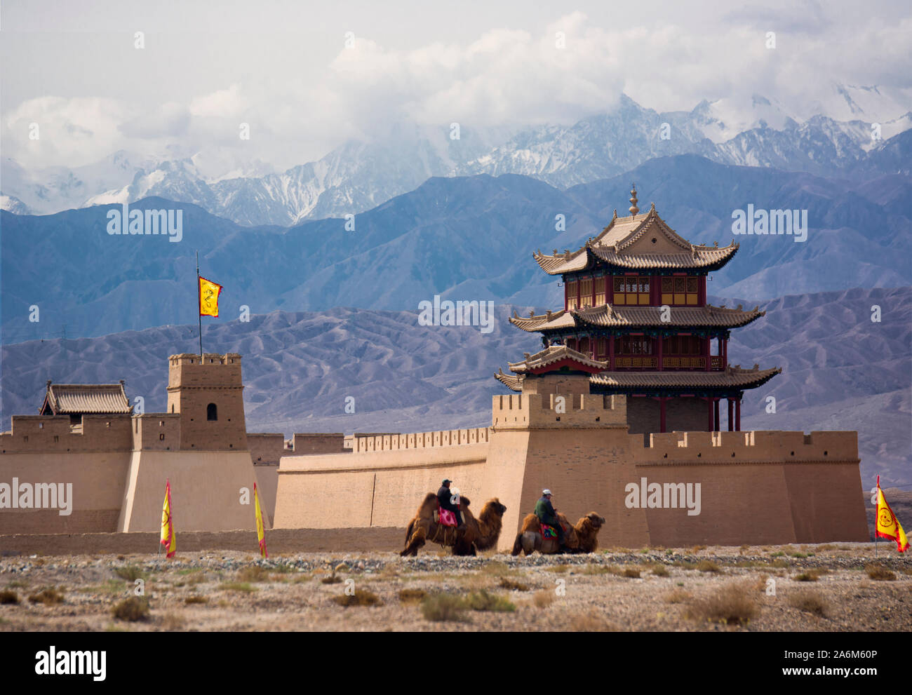 The Qilian Mountains behind the Jiayugian Fort, where camel caravans entered ancient to China after crossing the central Asian desert Stock Photo