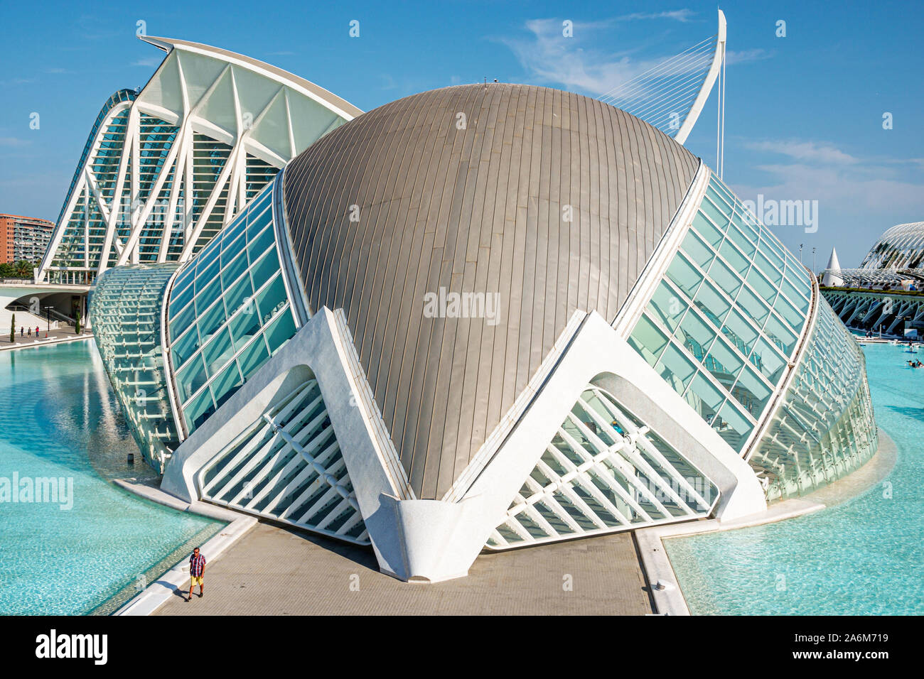 Valencia Spain,las Artes y las Ciencias,City of Arts & Sciences,Santiago Calatrava,architecture,L'Hemisferic planetarium laserium,exterior,water pool, Stock Photo