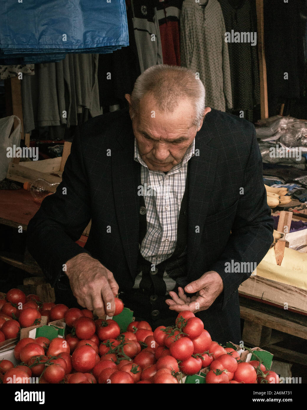 Kosovo, Pristina bazar. The salesman  on the maket Stock Photo