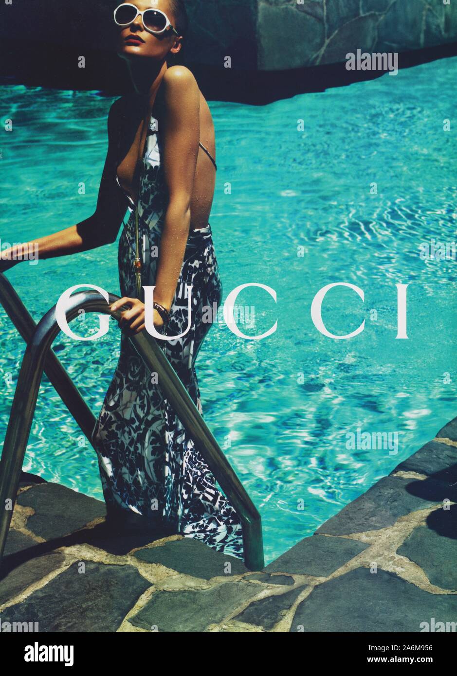 poster advertising GUCCI fashion house in paper magazine from 2010 year,  advertisement, creative GUCCI 2010s advert Stock Photo - Alamy