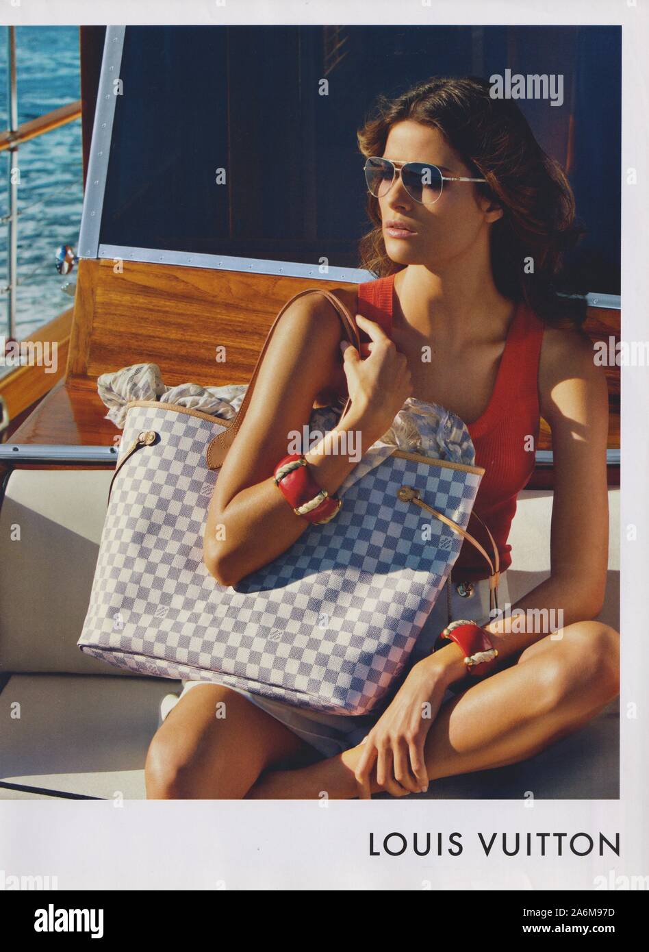 poster advertising Louis Vuitton handbag with Alicia Vikander actress in  paper magazine from 2015 year, advertisement, creative LV advert from 2010s  Stock Photo - Alamy