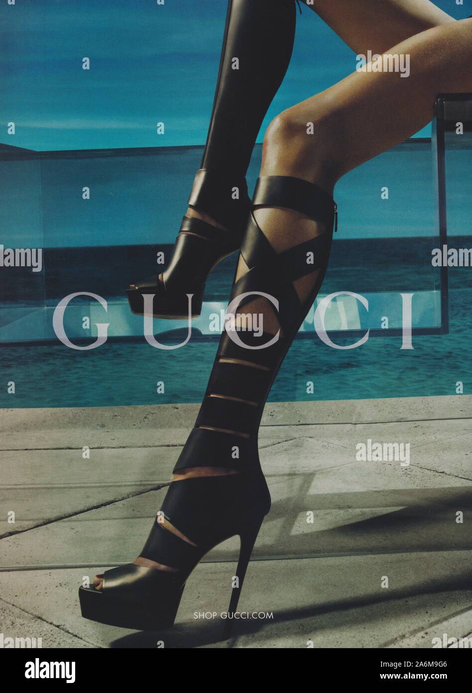 poster advertising GUCCI fashion house with Natasha Poly in paper magazine  from 2010 year, advertisement, creative GUCCI advert from 2010s Stock Photo  - Alamy