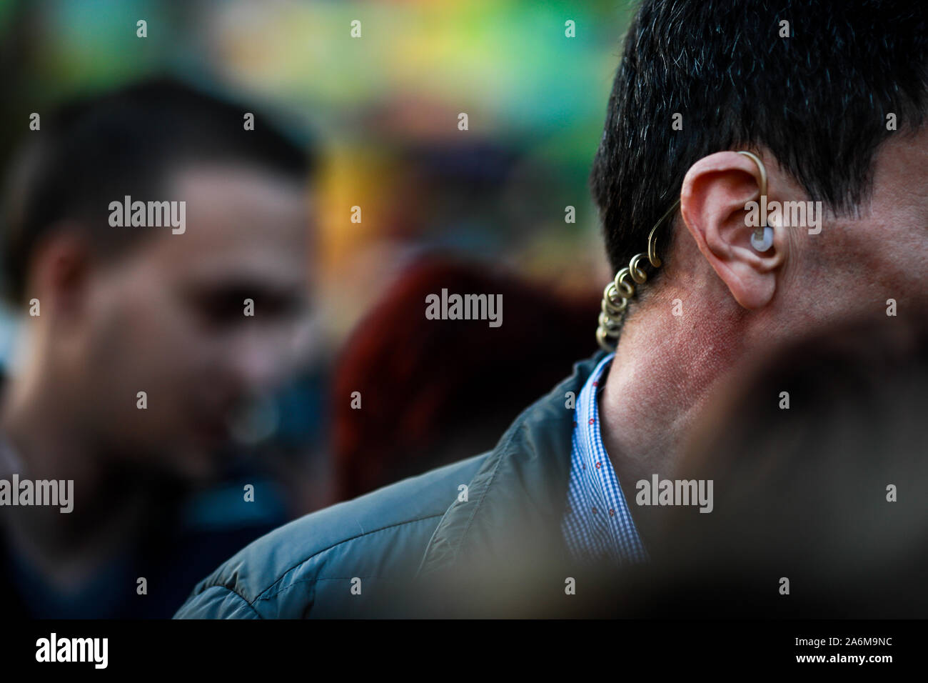 Shallow depth of field (selective focus) image with the coiled tube earpiece a Protection and Guard Service (SPP, Romanian version of the US Secret Se Stock Photo