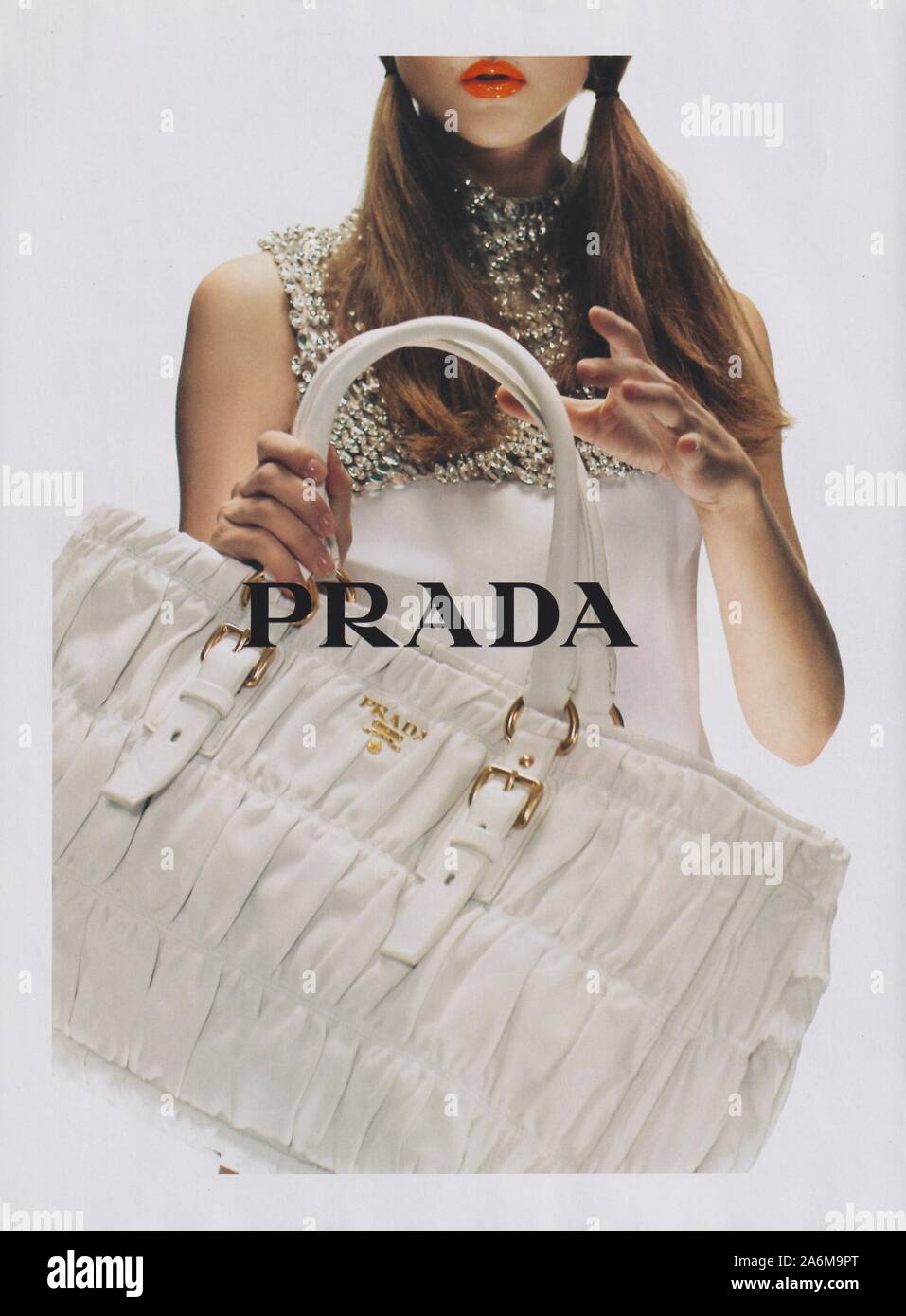 poster advertising PRADA fashion house in paper magazine from 2010 year,  advertisement, creative PRADA advert from 2010s Stock Photo - Alamy