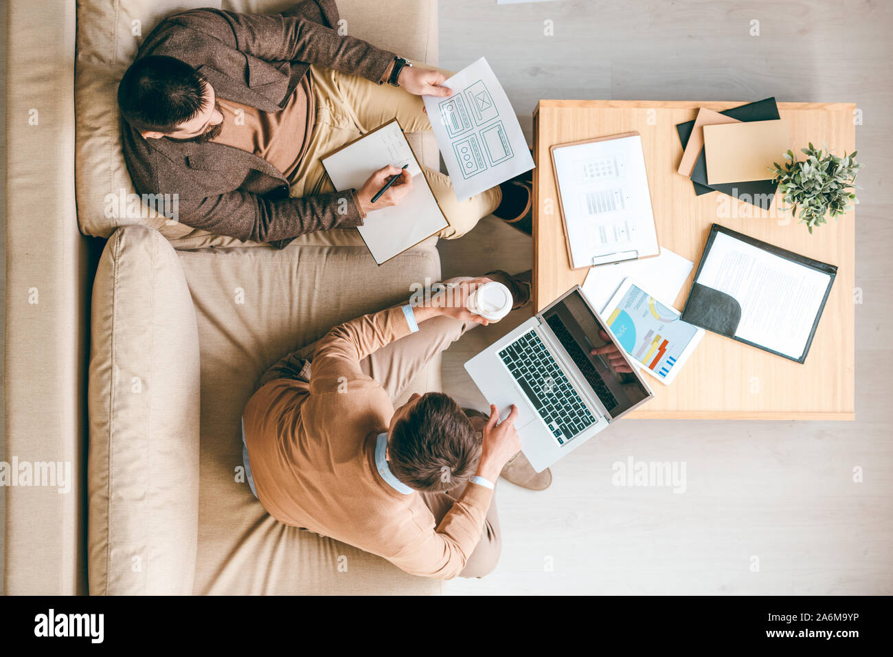 Two creative interface designers developing brand new software for smartphones Stock Photo