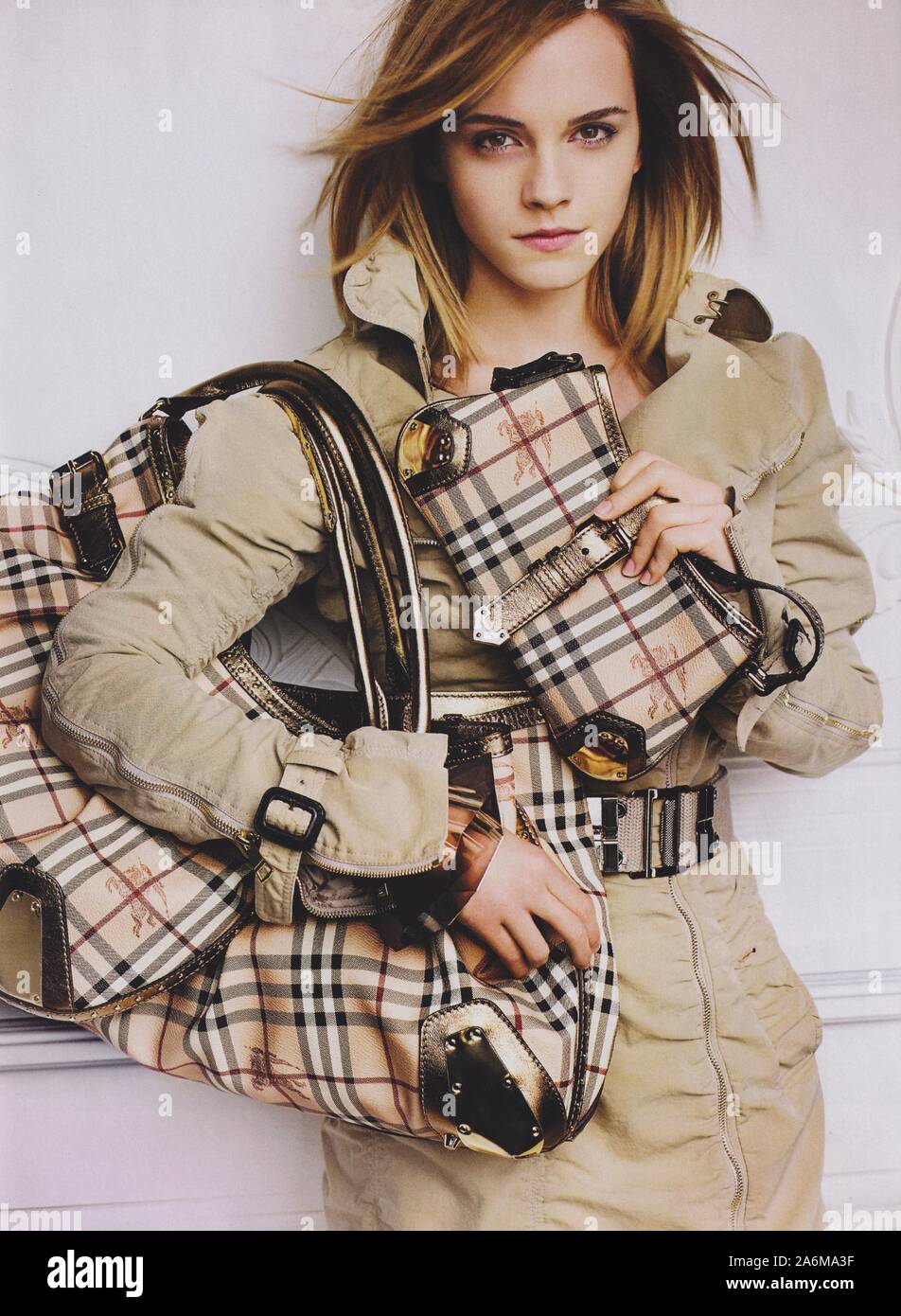 eend voorbeeld kopen poster advertising Burberry fashion house with Emma Watson in paper  magazine from 2010 year, advertisement, creative Burberry advert from 2010s  Stock Photo - Alamy