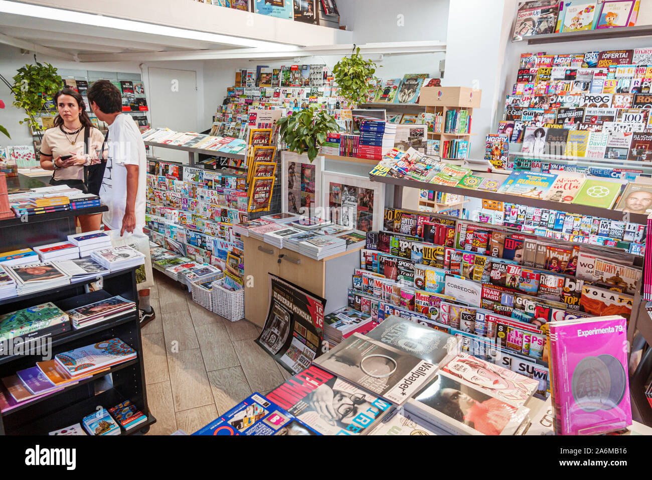 Barcelona Spain,Catalonia Sant Antoni,Free Time,bookstore,magazine shop,inside interior,display sale,man,woman,couple,shopping,Hispanic,ES190902085 Stock Photo