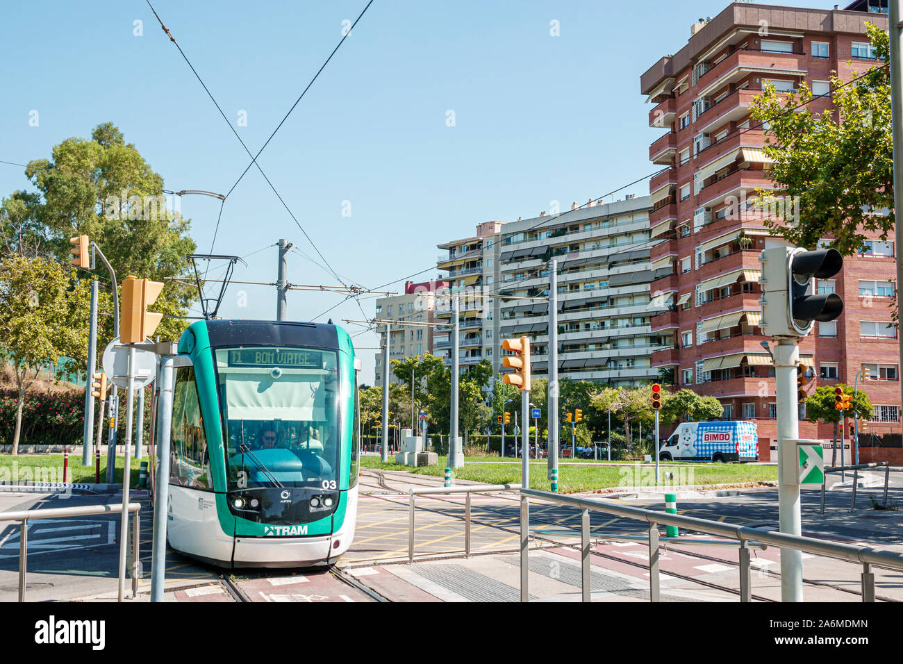 Barcelona Spain,Catalonia Les Corts,tram,exterior,Trambaix,light rail,overhead line wire,catenary,track,ES190904022 Stock Photo