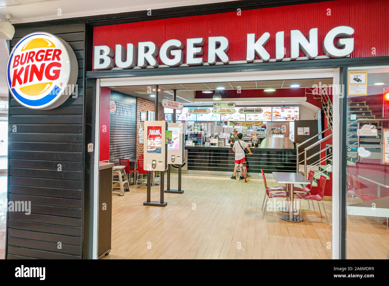 Barcelona Spain,Catalonia Cornella de Llobregat,Llobregat Shopping Center,inside,food court,Burger King, restaurant,fast food,hamburgers,entrance,logo Stock Photo