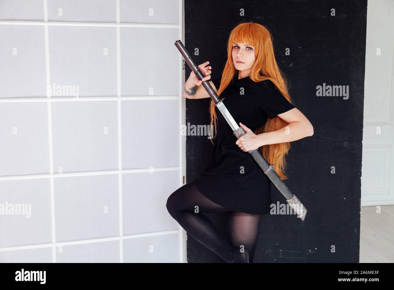 Girl sword Japan cosplayer anime red hair Stock Photo - Alamy Girl sword Japan cosplayer anime red hair Stock Photo - Alamy