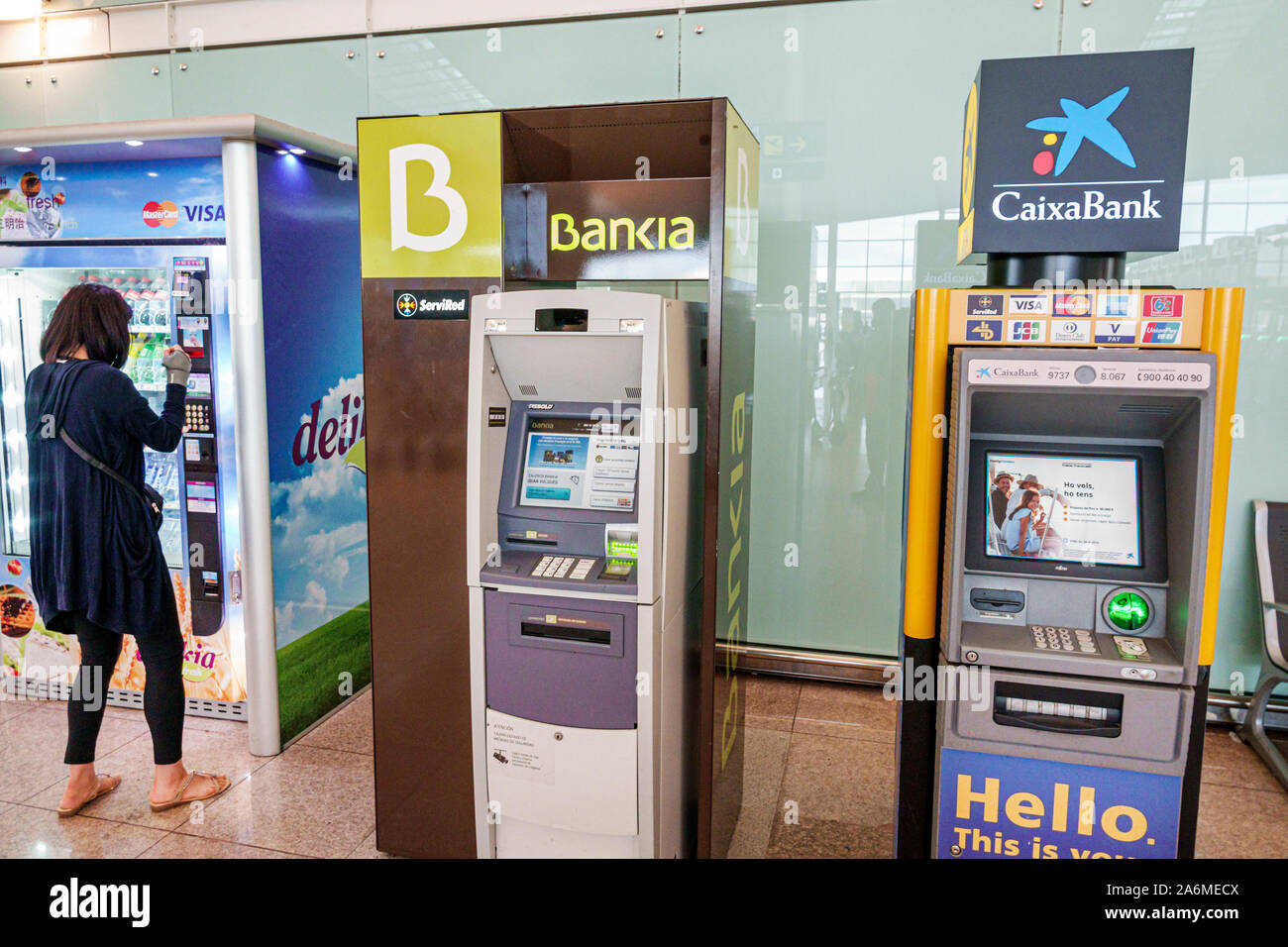 Barcelona Spain,Catalonia Barcelona-El Prat Josep Tarradellas Airport BCN,terminal T1,ATM,automatic teller machines,Caixa Bank,Bankia,vending machine, Stock Photo