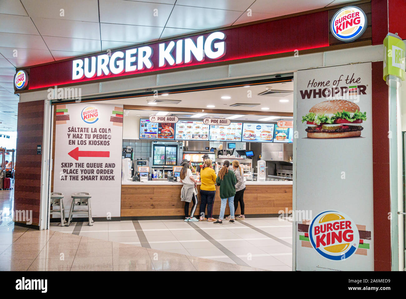 Barcelona Spain,Catalonia Barcelona-El Prat Josep Tarradellas Airport BCN,terminal T1,Burger King,fast food restaurant,counter,front entrance,inside,E Stock Photo